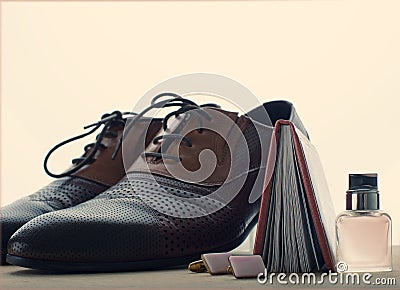 Shoes, perfume and cufflinks Stock Photo