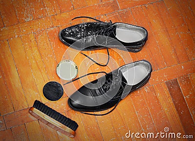 Shoeshine brush and cream Stock Photo