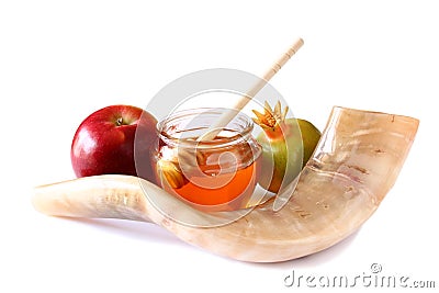 Shofar (horn), honey, apple and pomegranate isolated on white. rosh hashanah (jewish holiday) concept . traditional holiday symbol Stock Photo