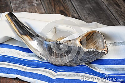 Shofar (horn) on white prayer talit. room for text. rosh hashanah (jewish holiday) concept . traditional holiday symbol. Stock Photo