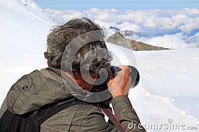 Shooting ice, snow and clouds of the Jungfraujoch Stock Photo