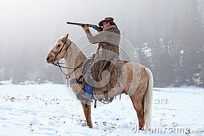 Shooting from the saddle Editorial Stock Photo