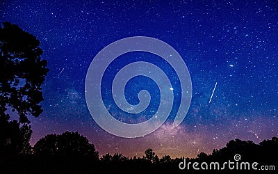 Shooting stars in an Alabama night sky Stock Photo