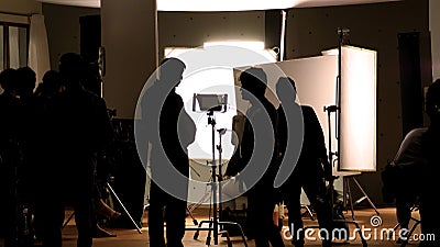 Shooting studio behind the scenes in silhouette images Stock Photo