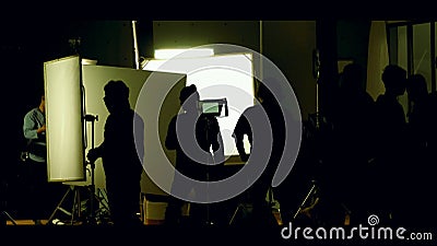 Shooting studio behind the scenes in silhouette images Stock Photo