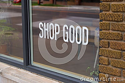 Shop good sign in window Stock Photo