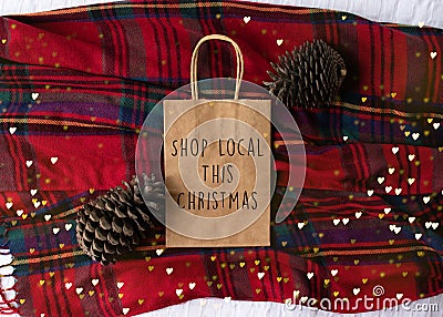Shop Local This Christmas text on a plain brown paper bag flat la Stock Photo