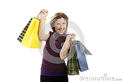 Shopaholic woman with colorful bags over white Stock Photo