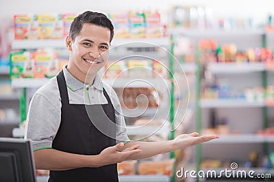 Shopkeeper in a grocery store Stock Photo