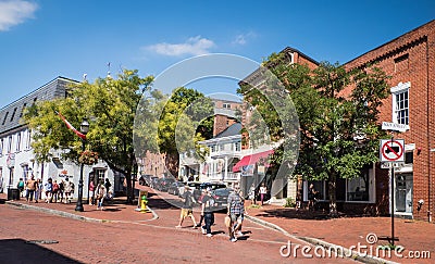 Shoppers cross the road at Main Street corner in Annapolis. Maryland Editorial Stock Photo