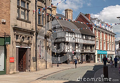 Shoppers on Cross Street in Oswestry Shropshire Editorial Stock Photo