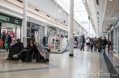 Shoppers inside a modern shopping centre mall Editorial Stock Photo