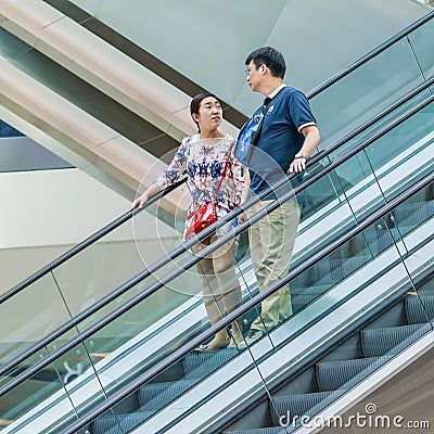 Shoppers at Livat Shopping Mall, Beijing, China Editorial Stock Photo