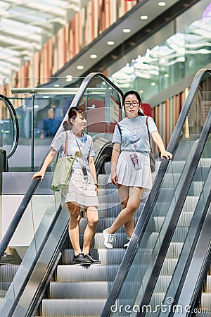 Shoppers at Livat Shopping Mall, Beijing, China Editorial Stock Photo