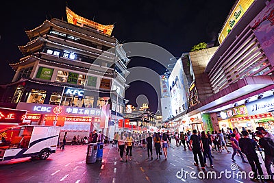 Shoppers and visitors crowd the famous Dongmen Pedestrian Street. Dongmen is a shopping area of Shenzhen Editorial Stock Photo