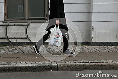 Shoppers with plastic shopping bags in Copenahgen Editorial Stock Photo