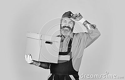 Shopping. Bachelor day. Moving routine. Packaging things. Delivery service. Loader. Post shipment. Forced to move. Man Stock Photo