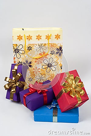 Shopping bag with wrapped gifts Stock Photo