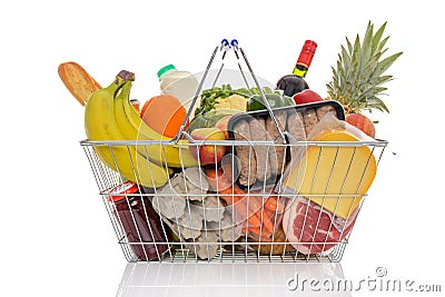 Shopping basket full of fresh food isolated Stock Photo