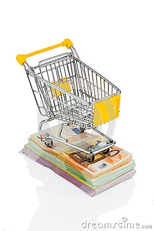 Shopping cart on bills Stock Photo