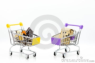 Shopping cart with coins for retail business. Image use for online and offline shopping, marketing place world wide, business Stock Photo