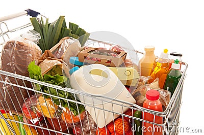 Shopping cart full dairy grocery Stock Photo