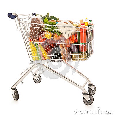 Shopping cart full dairy grocery Stock Photo