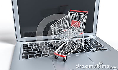 Shopping cart on a notebook keyboard. online shopping and ecommerce Stock Photo