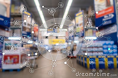 Shopping cart structure Retail marketing E-commerce blurred supermarket background. Stock Photo