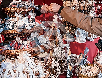 Shopping at Christmas market, selection of gifts and decor for the New Year tree Stock Photo