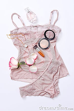 Shopping and fashion concept. Set of glamorous stylish lace lingerie with cosmetic products, perfume, flower petals Stock Photo