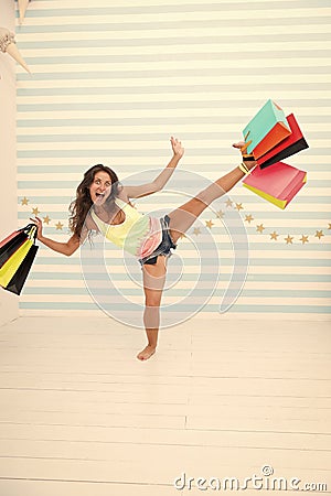 Shopping hunter girl with purchase after big sale. happy and excited woman with shopping bags. black friday sale in shop Stock Photo