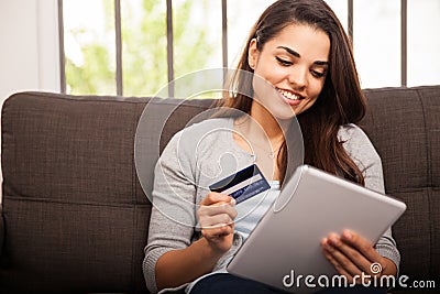 Shopping online with a tablet Stock Photo