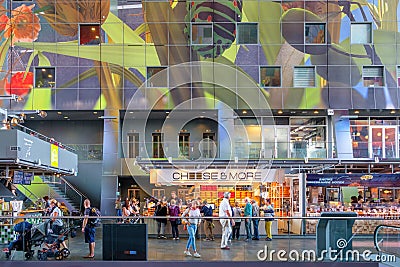 Shopping people inside the beautiful artistic and colorful market hall of Rotterdam, the Netherlands. Editorial Stock Photo