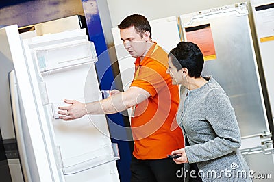 Shopping refrigerator with assistant Stock Photo