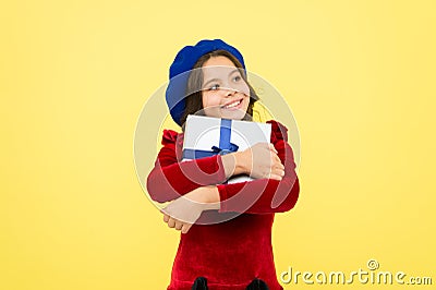 In shopping store. school fall season. happy small girl with present box. small girl hold holiday gift. happy birthday Stock Photo