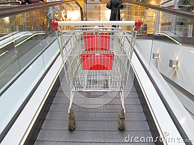 Shopping trolley on the elevator Stock Photo