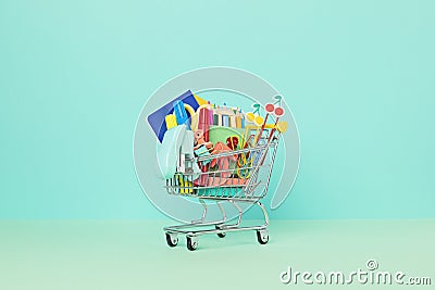 Shopping trolley full of school supplies. Preparation to school, shopping, sale, deals, discounts, promotion Stock Photo