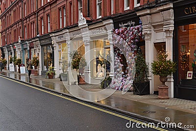Shops in London Chiltern Street Christmas trees decorations Editorial Stock Photo