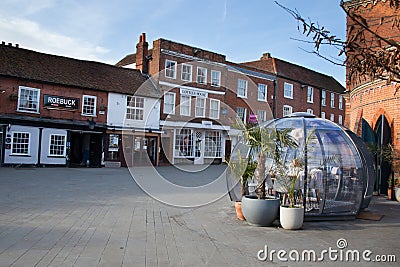 Shops and restaurants on Market Place in Wokingham in the UK Editorial Stock Photo