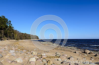 The shore of the Gulf of Finland, the blue sea with waves, Stock Photo