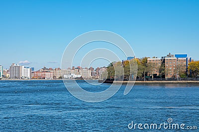 Shoreline of Astoria Queens New York with the East River and the Shore of Manhattan Stock Photo