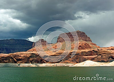 Shorelne with sandstone buttes on Lake Powell of Lake Powell. Stock Photo