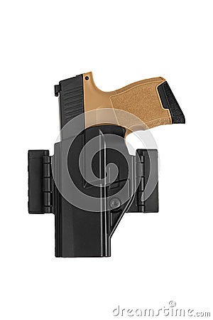 Short-barreled weapon in a plastic holster. Armament for the army and police. Modern semi-automatic pistol isolate on a white back Stock Photo