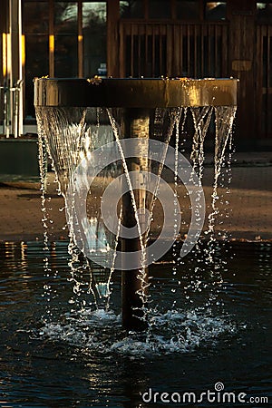 Short exposure photo of a fountain in Kouvola, Finland on an autumn sunrise Stock Photo