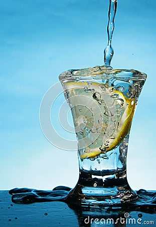 Short glass with lemon slice Stock Photo
