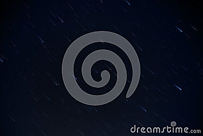 Short gradual star trails at night sky Stock Photo