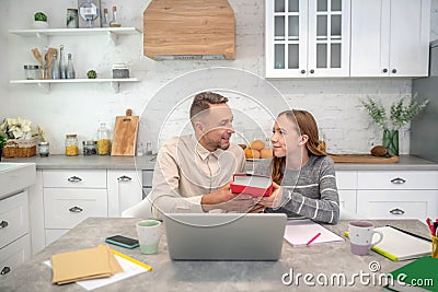 Short-haired bearded teacher having a lesson with his student Stock Photo