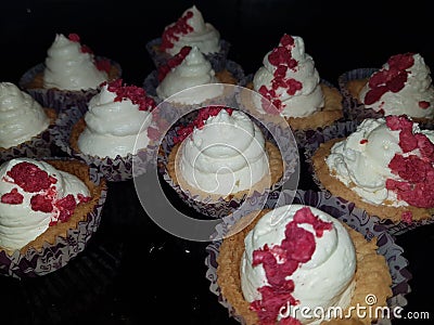 Shortbread with chantilly cream and raspberries cups Stock Photo