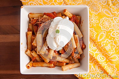 shortrib ragout over rigatoni pasta with ricotta Stock Photo